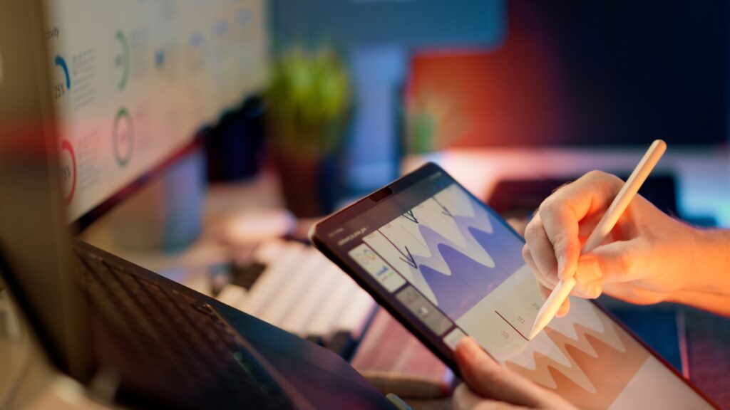 Someone is sketching or drawing on a tablet.