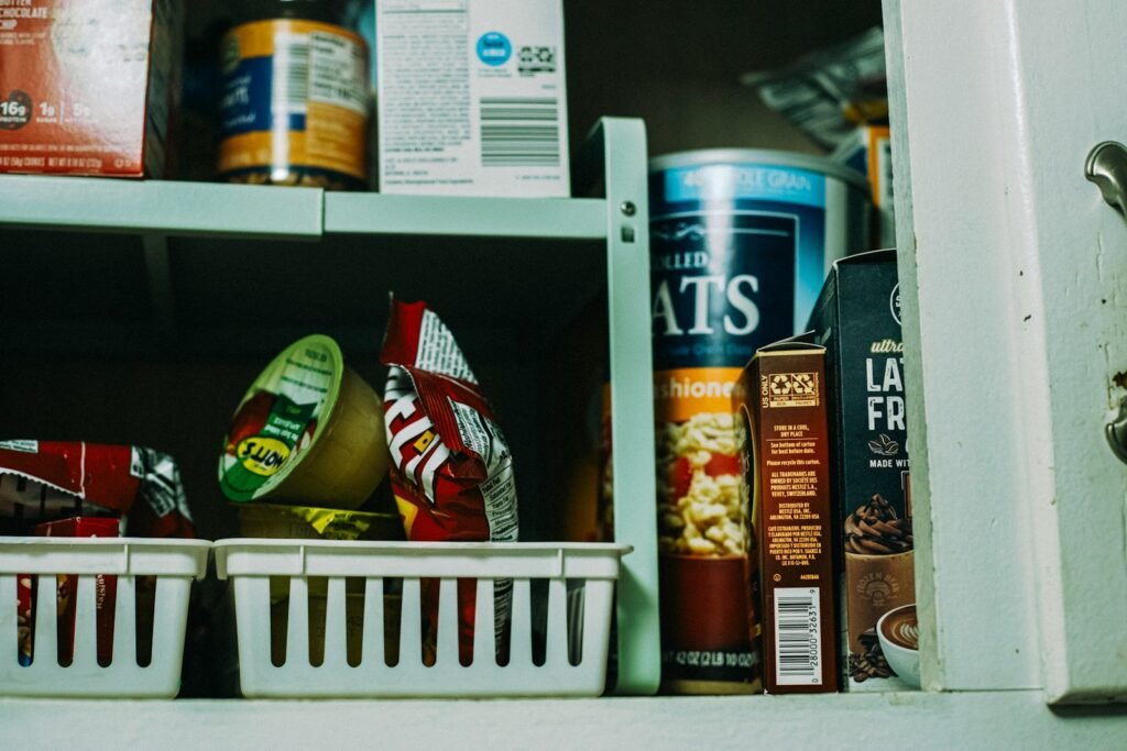 a shelf filled with lots of different types of food