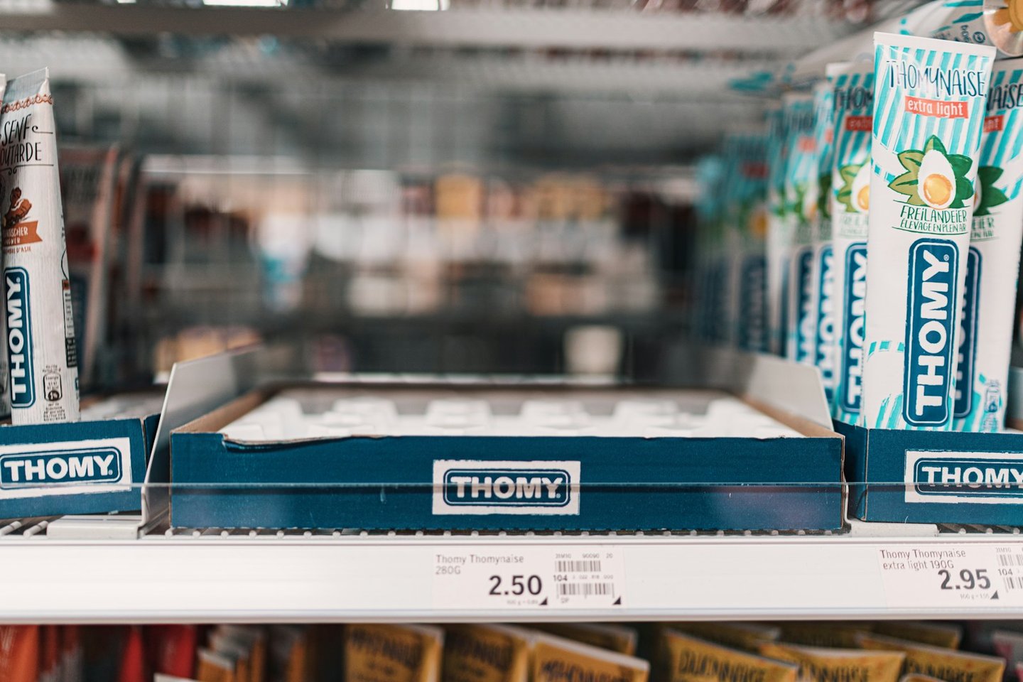 blue and white box on white shelf